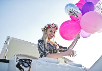 blonde-girl-in-wreath-sitting-on-yacht-at-hen-part-2023-11-27-05-14-21-utc